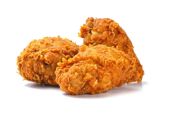 Fried yellow crispy chicken legs on white background — Stock Photo, Image