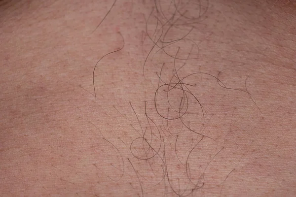 Immagine di pelle con i capelli neri, foto in primo piano — Foto Stock