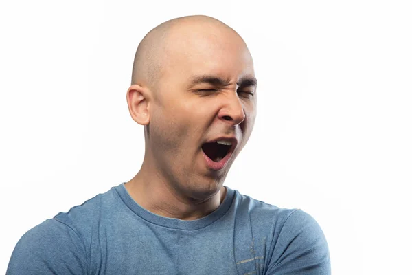 Photo of yawning bald man on white background — Stock Photo, Image