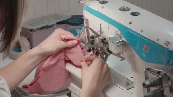 Video of woman sewing order on machine — Stock Video