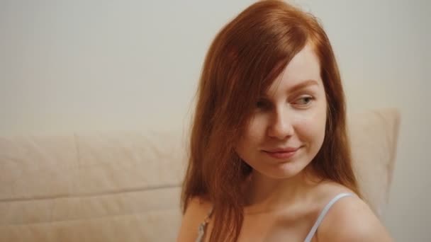 Video of ginger young woman in blue lace pajamas — Stock Video