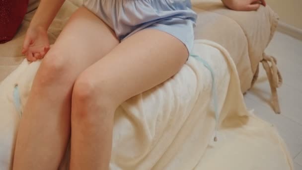 Ginger young woman in blue lace pajamas in home interior — 비디오