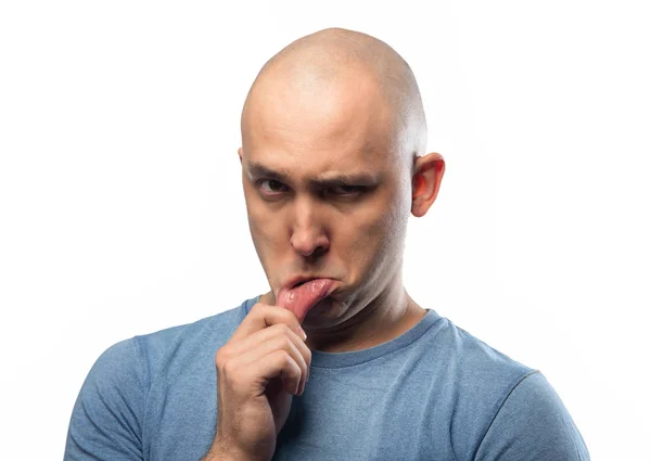 Photo of young bald offended man in blue tee shirt — Stok fotoğraf