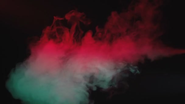 Video colour cloudy smoke of electronic cigarette on black background — Stok video