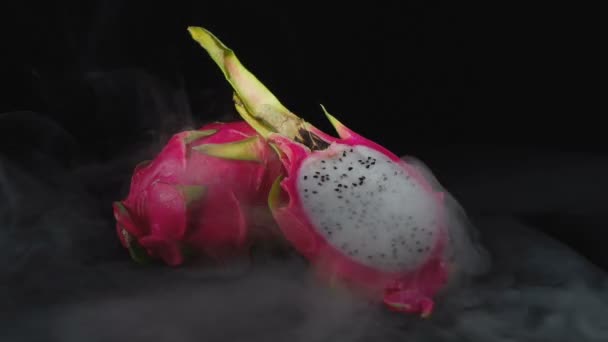 Video of exotic pitahaya in the smoke — Stock Video