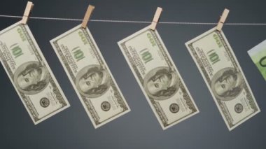 Çamaşır ipinde kuruyan banknotların görüntüsü