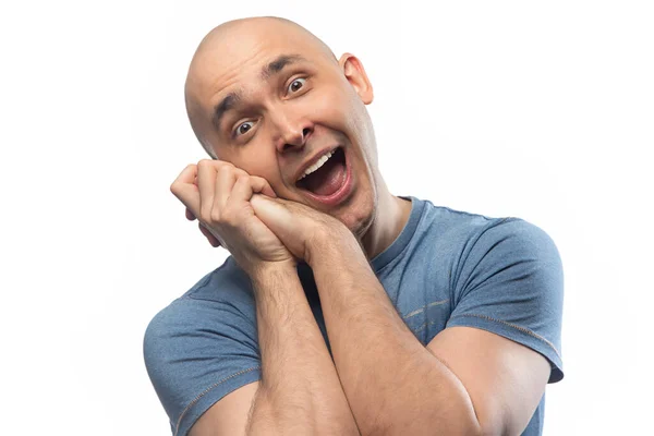 Image of bald winning man in blue tee shirt — Stock Photo, Image
