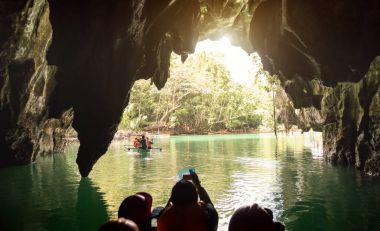 Inside view point of Puerto Princesa Palawan subterranean underground river at exit side - Adventurous exclusive Philippines destinations - Dark lighting with real feelings from visitor perspective clipart