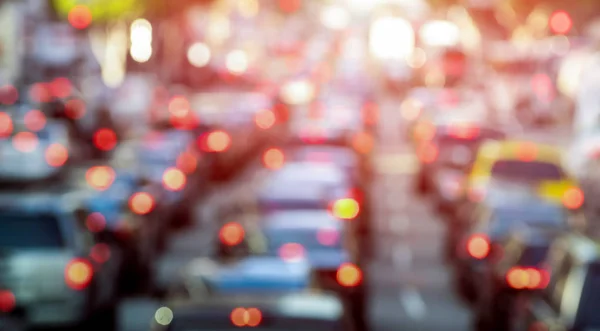 Rush hour with defocused cars and generic vehicles - Traffic jam in Los Angeles downtown - Blurred bokeh postcard of american iconic city with dark contrast sunshine filter - Transportation concept — Stock Photo, Image