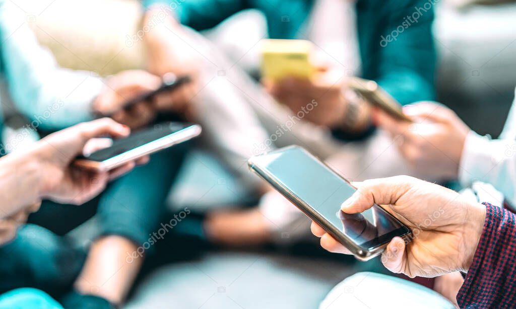 Close up of people using mobile smart phones - Detail of friends sharing photos on social media network with smartphone - Technology concept and cellphone culture with selective focus on right hand