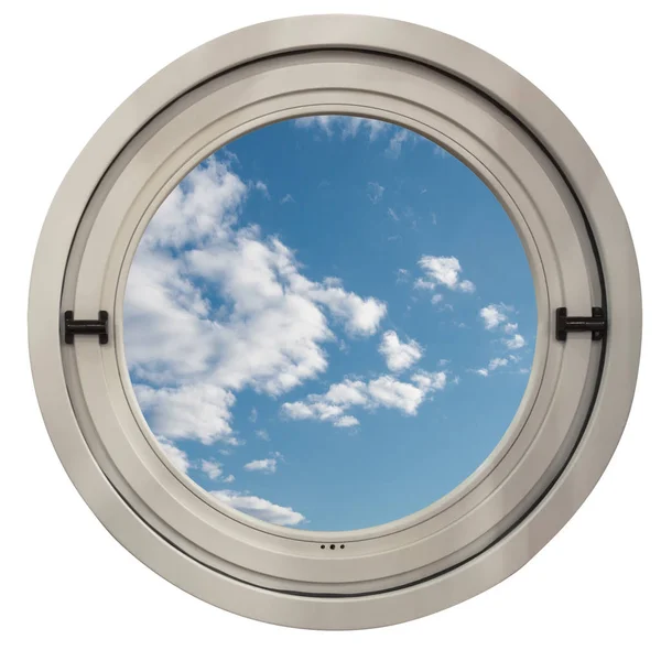 圆窗俯瞰着蓝蓝的天空和轻云 — 图库照片