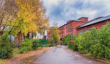 Moscow. October 4, 2019. Beautiful autumn landscape with a wet road and Business center 