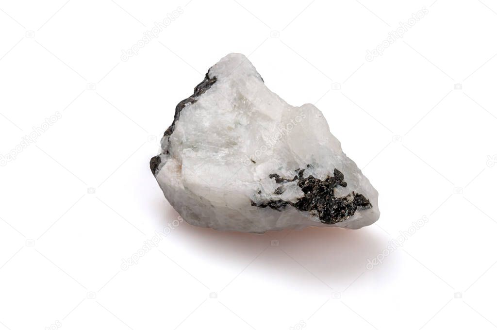 Moonstone on white background. Decorative stone for jeweler. Gemologist and litoterapii. Nugget.