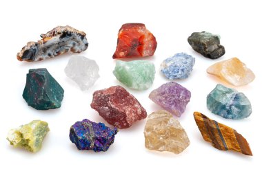 Different stones minerals on a white background. Tiger eye and Topaz, will chalcopyrite, serpentine, fluorite, amethyst, strawberry quartz, Bloodstone, citrine, sodalite clipart