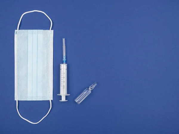 Medical Mask Syringe Ampoule Blue Background Set Nurses View Top — Stock Photo, Image