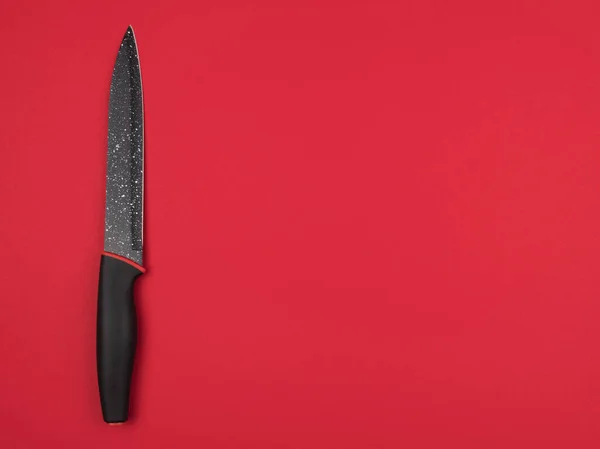 Nóż Kuchenny Czerwonym Tle Widok Góry Zbliżenie — Zdjęcie stockowe
