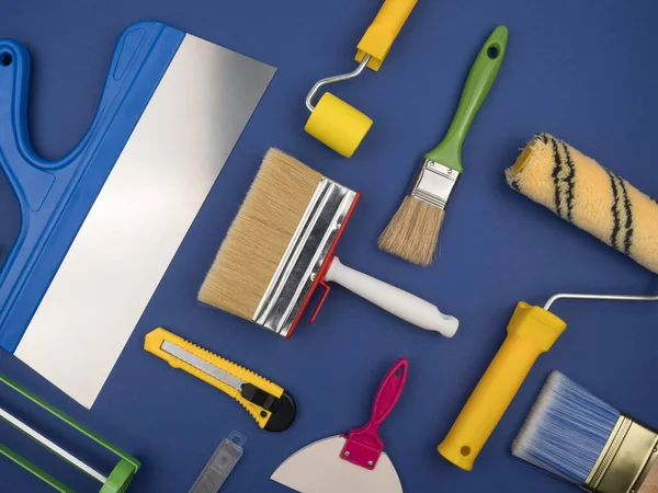 Set of construction tools on a blue background. The concept of repair. Stock Picture
