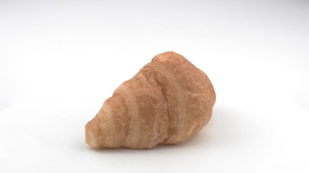 Croissant on white background closeup. — Stock Video