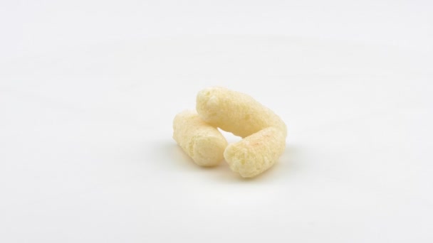 Corn sticks on a white background closeup. — Stock Footage Corn sticks on a white background closeup. Video Clip
