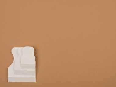 Bej arka planda lastik spatula. Gruplama için Spatula.