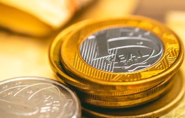 real coins on blurred background, brazilian currency