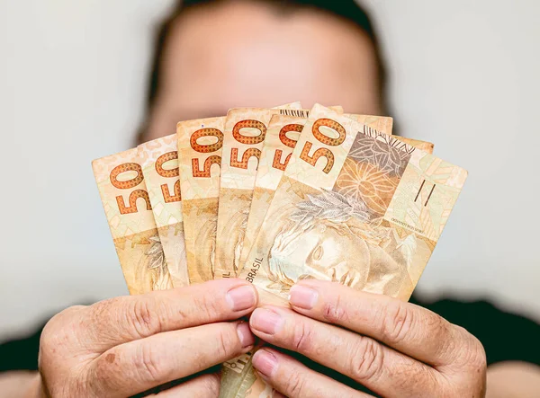 Gerçek Brezilya Para Birimi. Para, Brezilya, Dinheiro, Reais. 50 Reais 'lik kadın grubu..