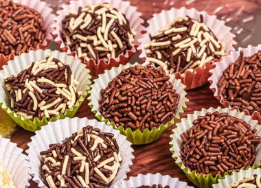Chocolate truffles or brigadeiro typical Brazilian sweet. Most traditional sweet of birthday parties.