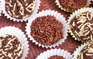 Chocolate truffles or brigadeiro typical Brazilian sweet. Most traditional sweet of birthday parties.