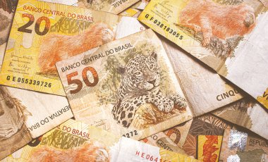 Brazilian Real banknotes in close up photography. Brazilian economy and finance concept 