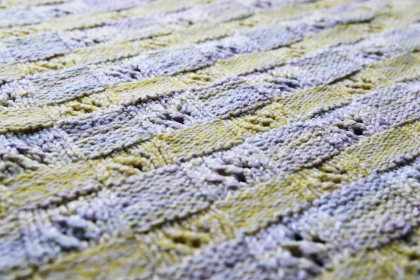 Textura fondo de merino manta de punto, minimalismo escandinavo telón de fondo vista superior. Fondo abstracto de tejido de punto de lana amarilla — Foto de Stock