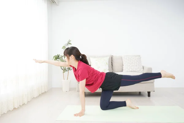 Portrait Sporty Asian Woman Stretching Home — Stock Photo, Image