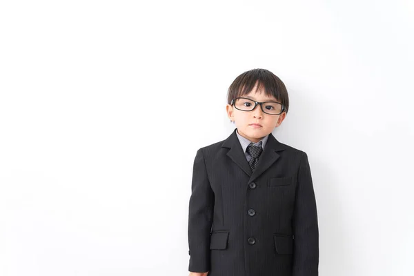 Little Boy Wearing Suit Eyeglasses Posing Studio White Background — Stock Photo, Image