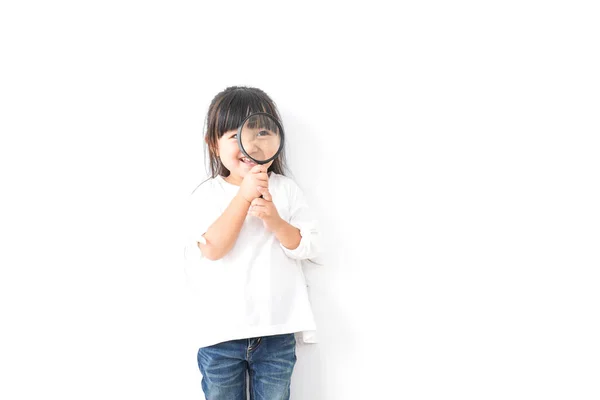 Little Asian Girl Holding Magnifying Glass Isolated White Background — Stock Photo, Image