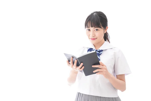 Retrato Asiático Jovem Mulher Escola Uniforme Segurando Livro Isolado Branco — Fotografia de Stock