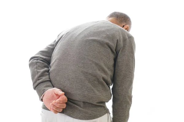 腰痛に苦しむ高齢のアジア人男性 — ストック写真