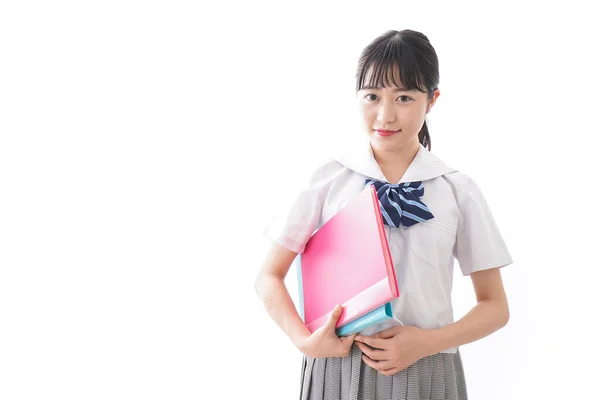 Retrato Asiático Jovem Mulher Escola Uniforme Segurando Pastas Isolado Fundo — Fotografia de Stock