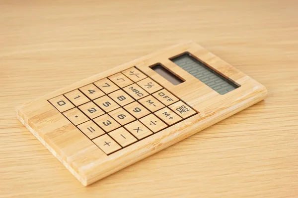 Dřevěná Kalkulačka Dřevěném Pozadí — Stock fotografie