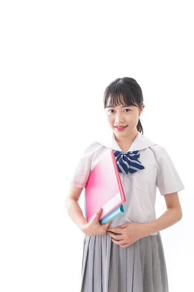 Retrato Asiático Jovem Mulher Escola Uniforme Segurando Pastas Isolado Fundo — Fotografia de Stock