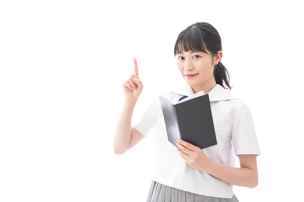 Retrato Asiático Jovem Mulher Escola Uniforme Segurando Livro Isolado Branco — Fotografia de Stock