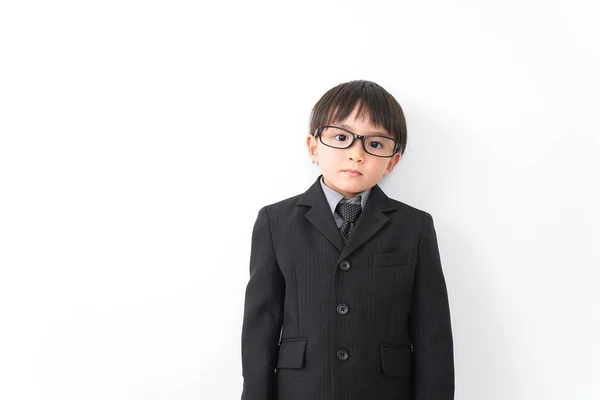 Little Boy Wearing Suit Eyeglasses Posing Studio White Background — Stock Photo, Image