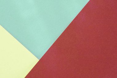 Yeşil bordo kağıt arka plan. Geometrik şekiller, şekiller. Soyut geometrik düz kompozisyon. Tek renkli karton üzerinde boş boşluk