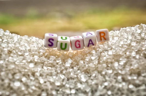 sugar writing text on sugar Heap,writing on sugar  agglomerate,s