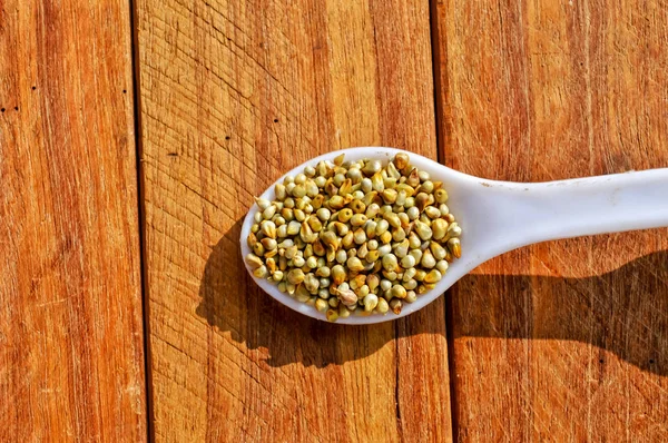 Organic Healthy Millet in a Spoon,Healthy Kodo Millets Close up ストック写真