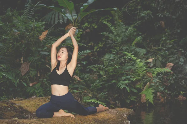 Yoga women in nature relax in nature