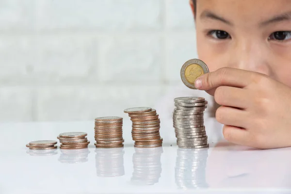 asian boy counting money