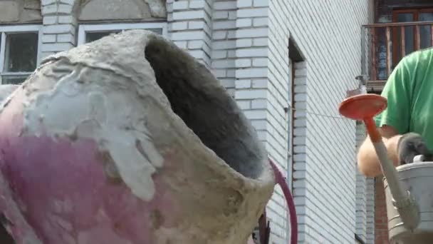 Concrete Works Home Man Pours Water Watering Can Rotating Concrete — Stock Video