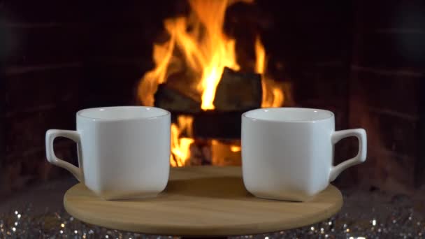 Christmas New Year Fireplace Two Empty Teacups Stand Small Table — Stock Video