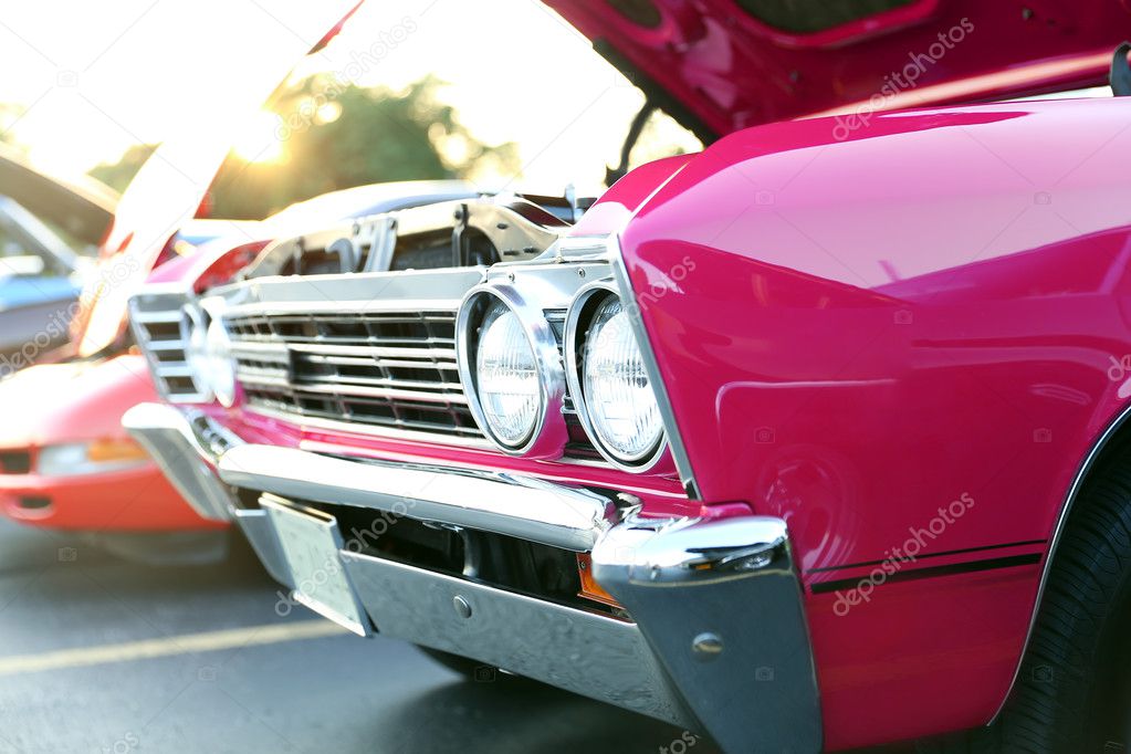 classic retro  vintage pink car. Auto show