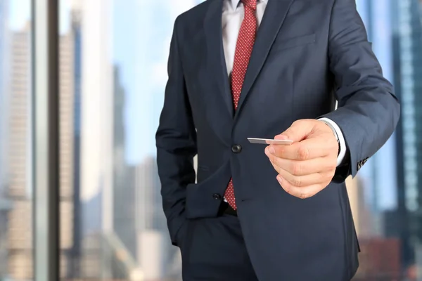 Close up portrait of  businessman  giving  a  business card — Stock Photo, Image