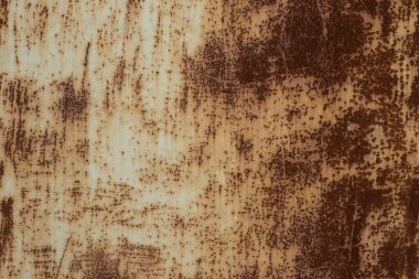 Paslı, kirli, boyanmış metal bir yüzey. Aşınma izi olan çelik madde.